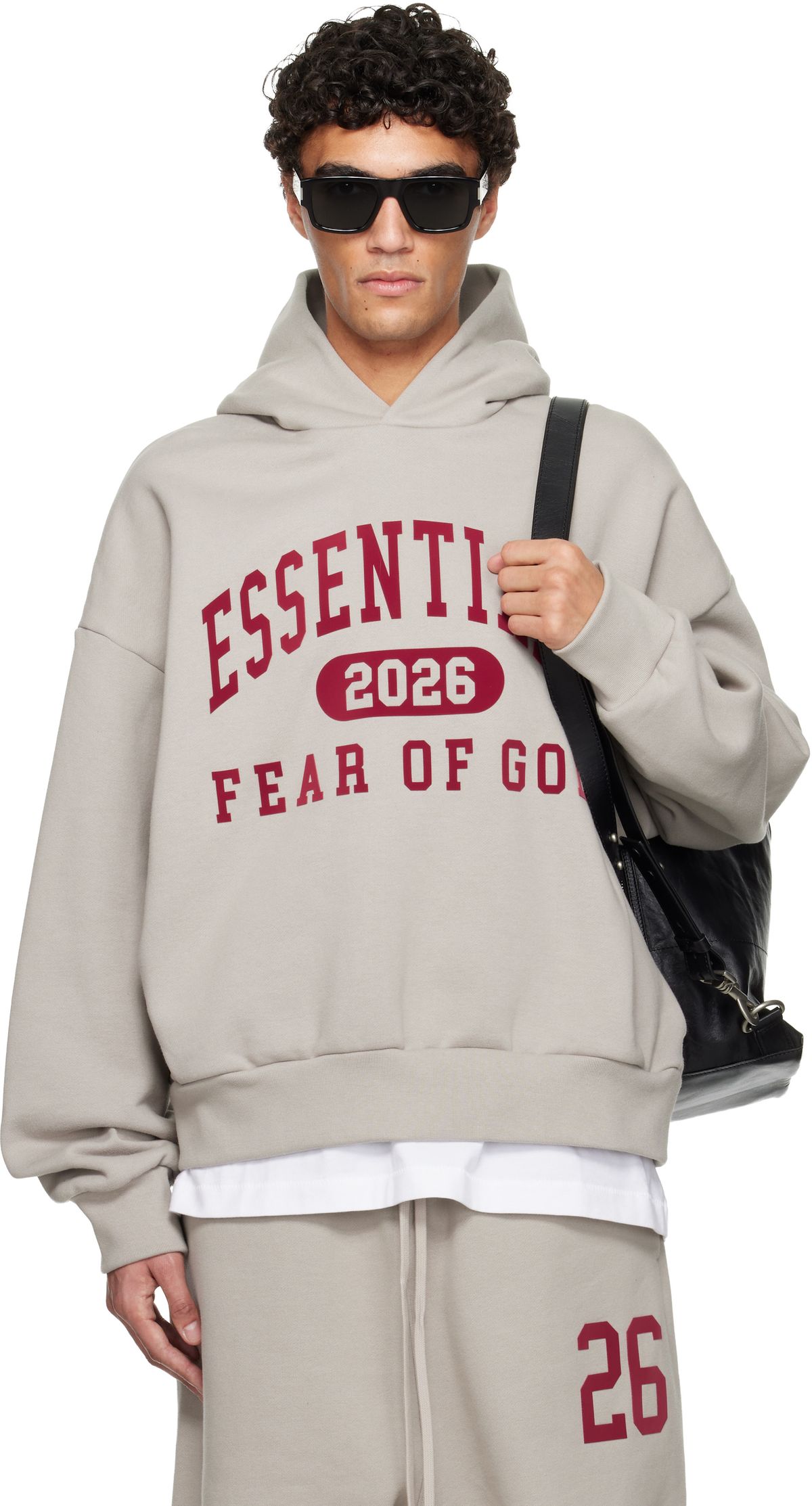 Fear of God Essentials Gray Holiday Classic Hoodie displayed at SSENSE