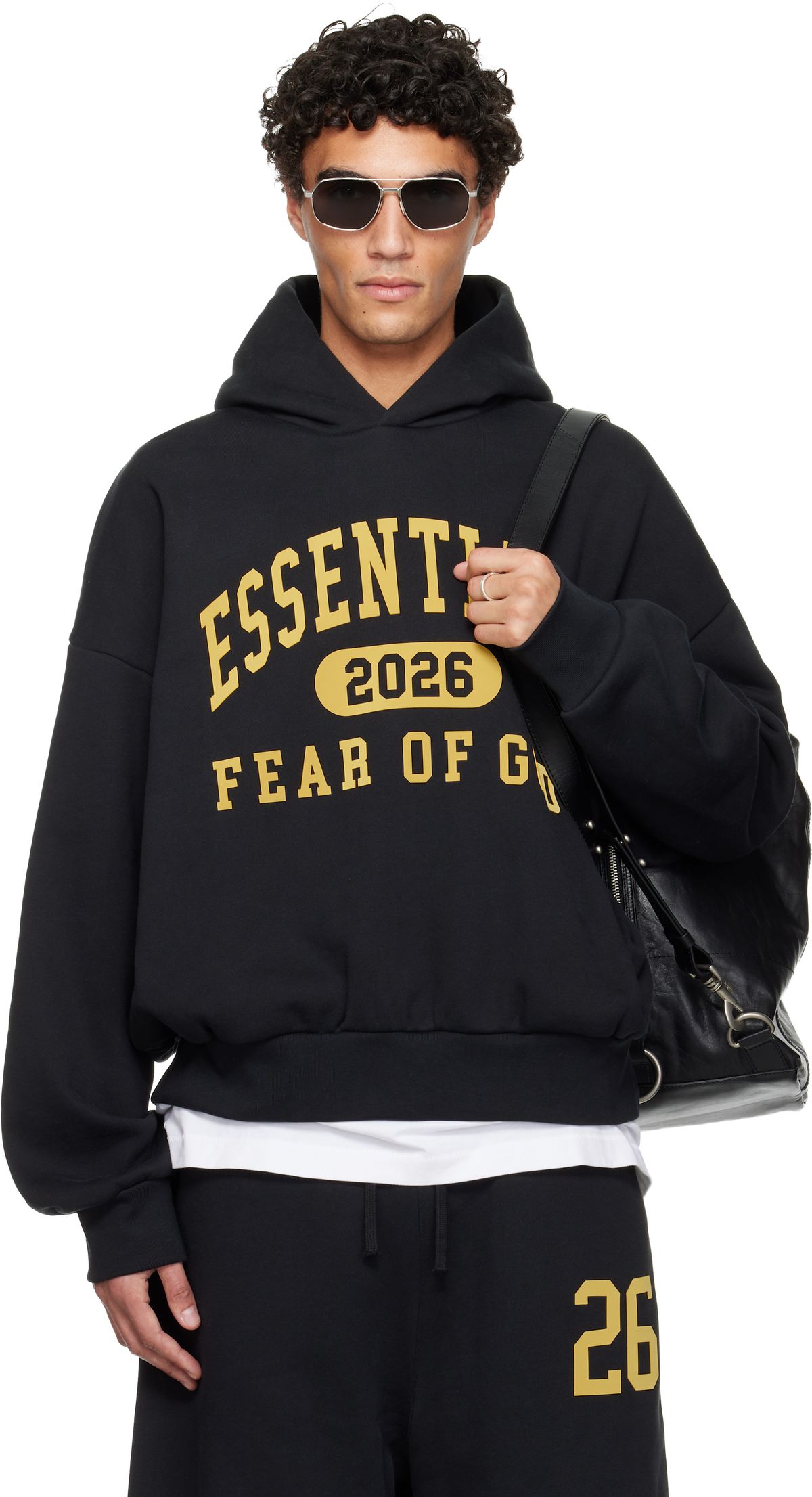 Fear of God Essentials Black Holiday Classic Hoodie, oversized fit with kangaroo pocket and drawstring detail