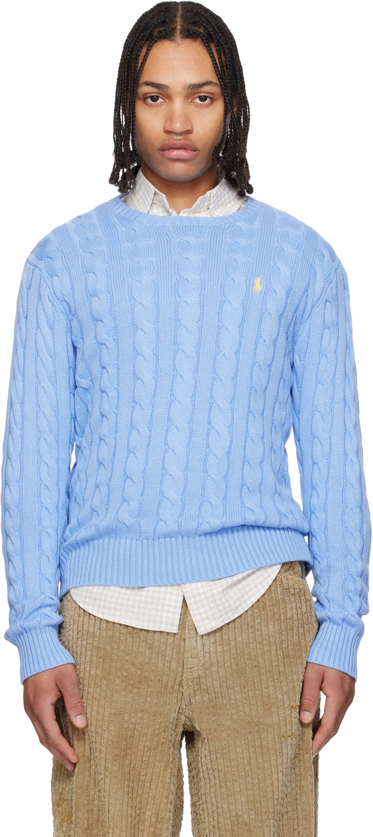 Polo Ralph Lauren blue cable-knit cotton sweater, hero shot showing twisted knit pattern detail and classic fit