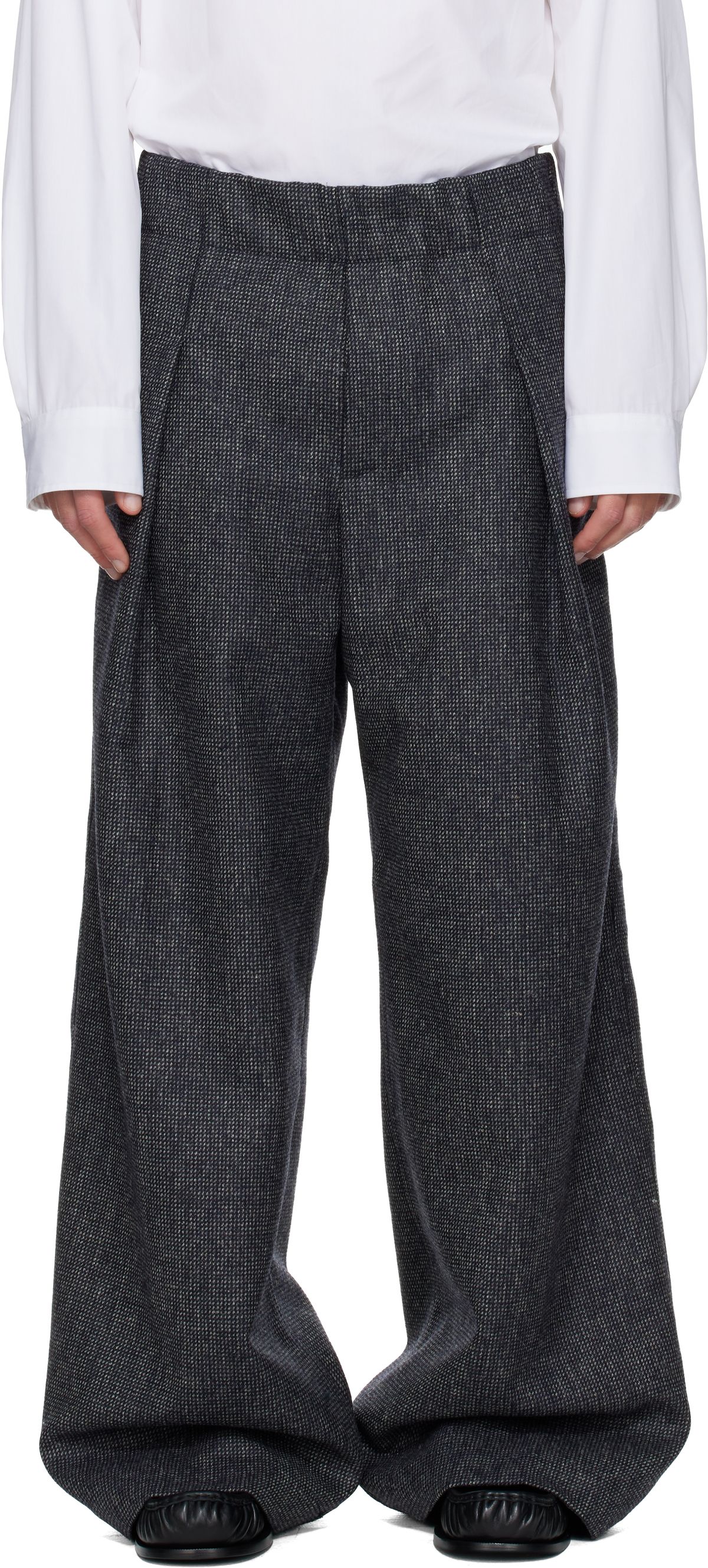 Dries Van Noten navy wool trousers, tailored fit, shown as flat lay on neutral background