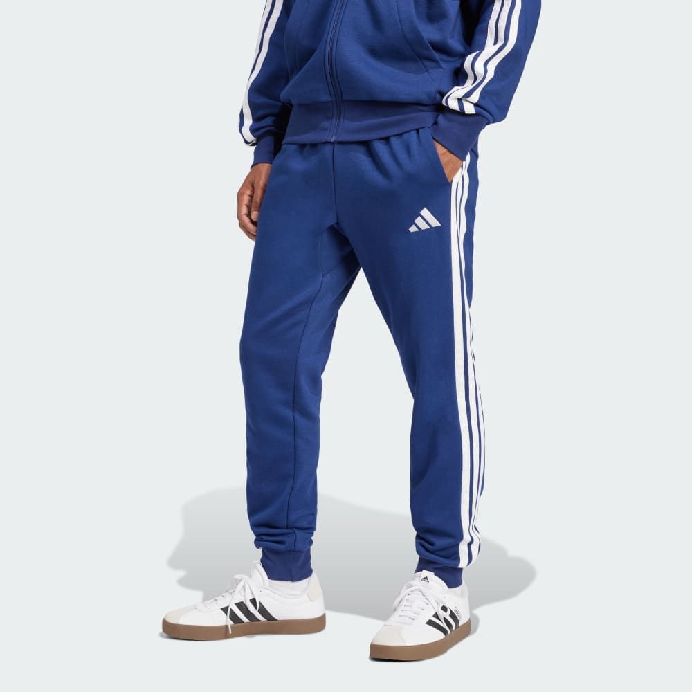 adidas Essentials 3-Stripes Fleece Pants in black with signature 3-Stripes branding down outer leg