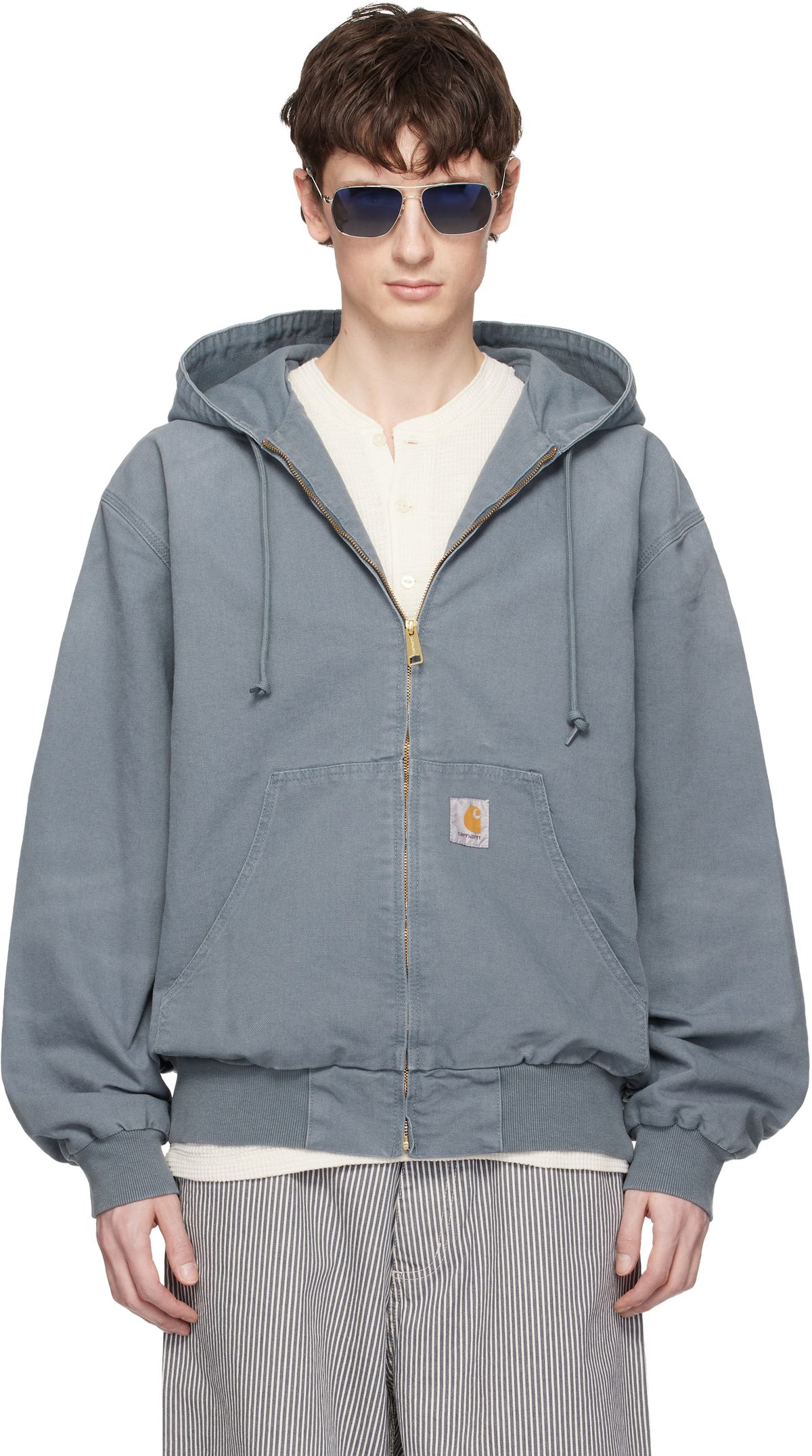 Carhartt Work In Progress Blue OG Active Jacket in blue canvas, front view showing utilitarian pocket placement and structured shoulders