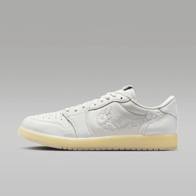 Air Jordan 1 Retro Low OG in Sail/Coconut Milk/Off White, side profile view showing leather upper and classic wing logo