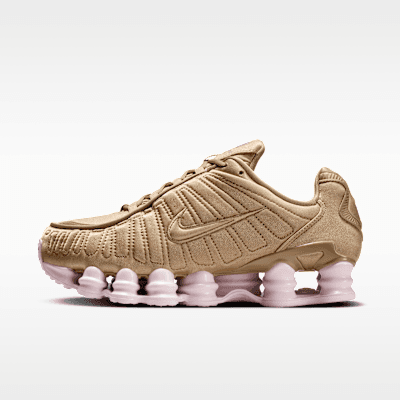 Nike Shox TL Women's shoe in Filbert, Pink Foam, Metallic Silver, and Filbert colorway showing distinctive column cushioning system