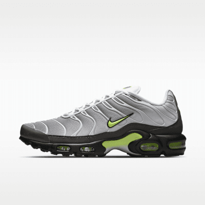 Nike Air Max Plus Men's Shoes in White, Pearl Grey, Black, and Neon Yellow colorway (IQ0288-100), showcasing the signature Tuned Air pod and wraparound design